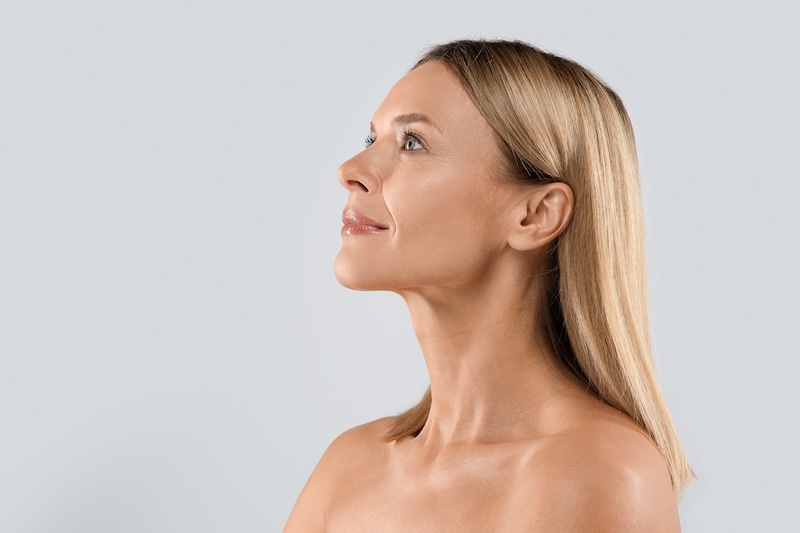 Side profile of woman smiling